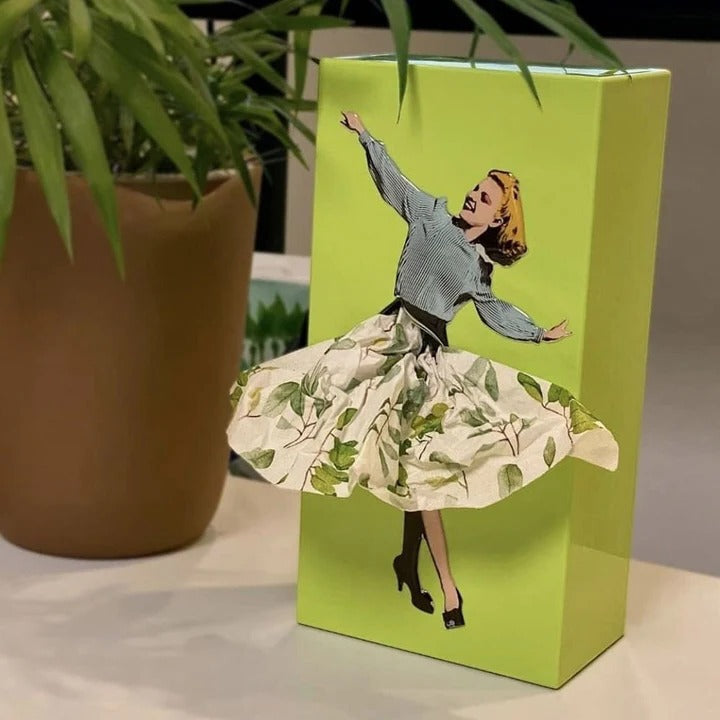 Tissue Box Cover with Animated Skirt Motion and Weighted Base